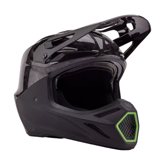 Black motorcycle helmet with green accents on a white background